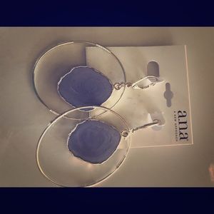 Large hoop earrings with periwinkle stones